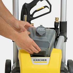 A person detaching the detergent tank of the K1700