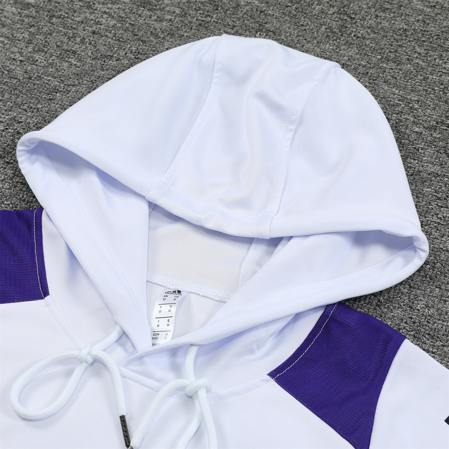 ManixJersey.com | Real Madrid 24-25 Training Hoodie Set - White Hoodie and Black Pants -Customize Name, Number and Patch | Worldwide Shipping