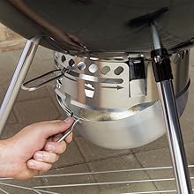 Weber One-Touch Cleaning System is an ash clearing system for charcoal grills