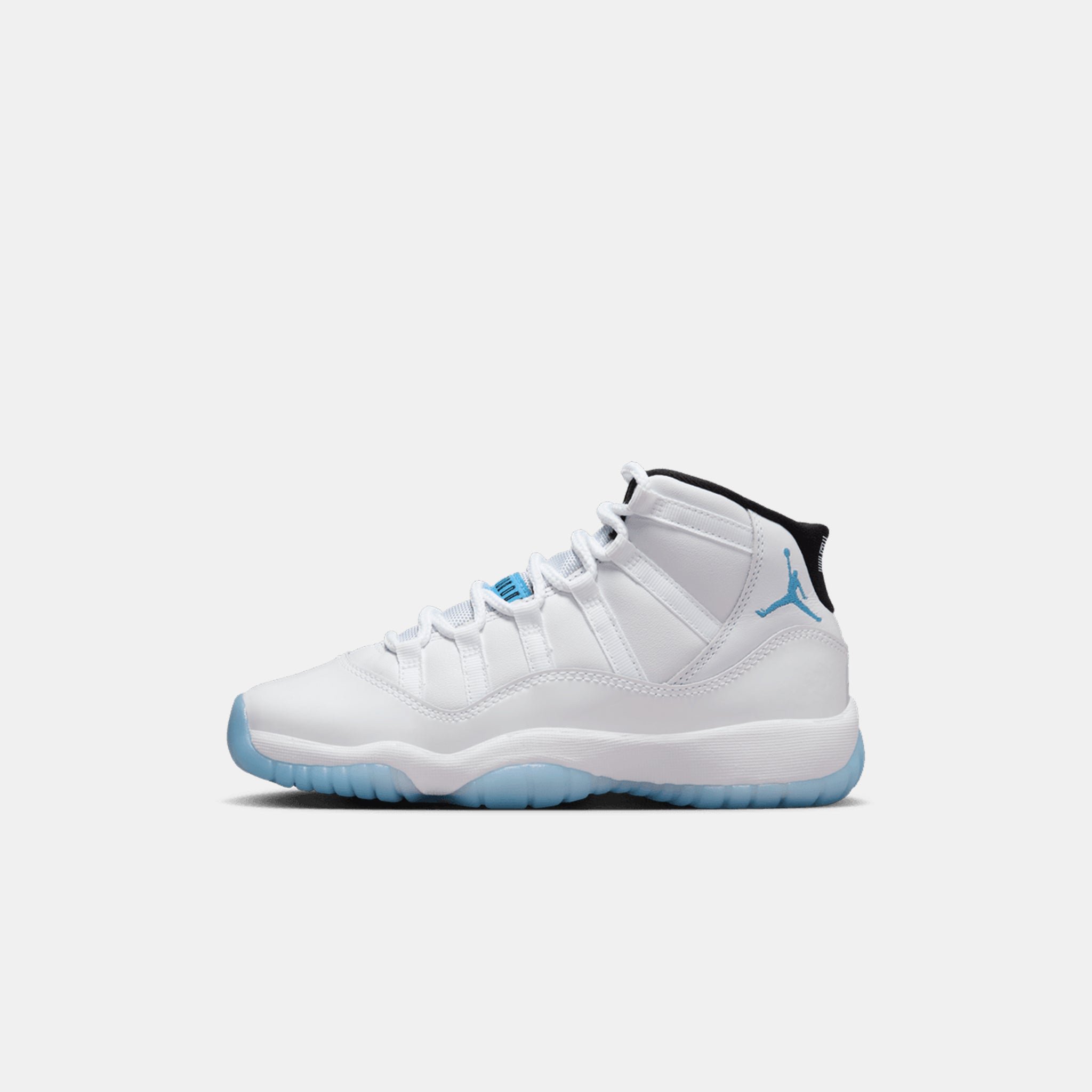 Air Jordan 11 Retro Big Kids Sneaker in White/Legend Blue/Black