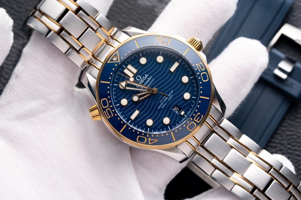 Đồng Hồ Omega Seamaster DemiGold Replcia 11 Mặt Xanh 42mm (1)