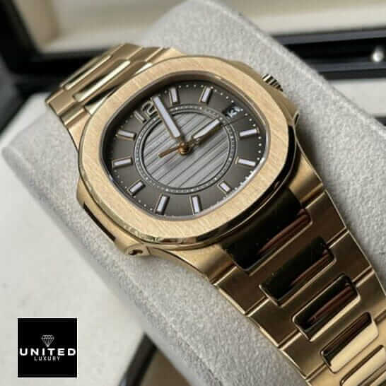 Patek Philippe Nautilus 7011/1R-010 Replica 6 Patek Philippe 7011-1r-010 Black Dial Gold Bracelet Replica on the stand