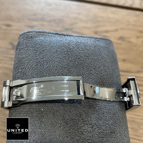 Rolex Datejust 126200-0008 with gray stand open clap