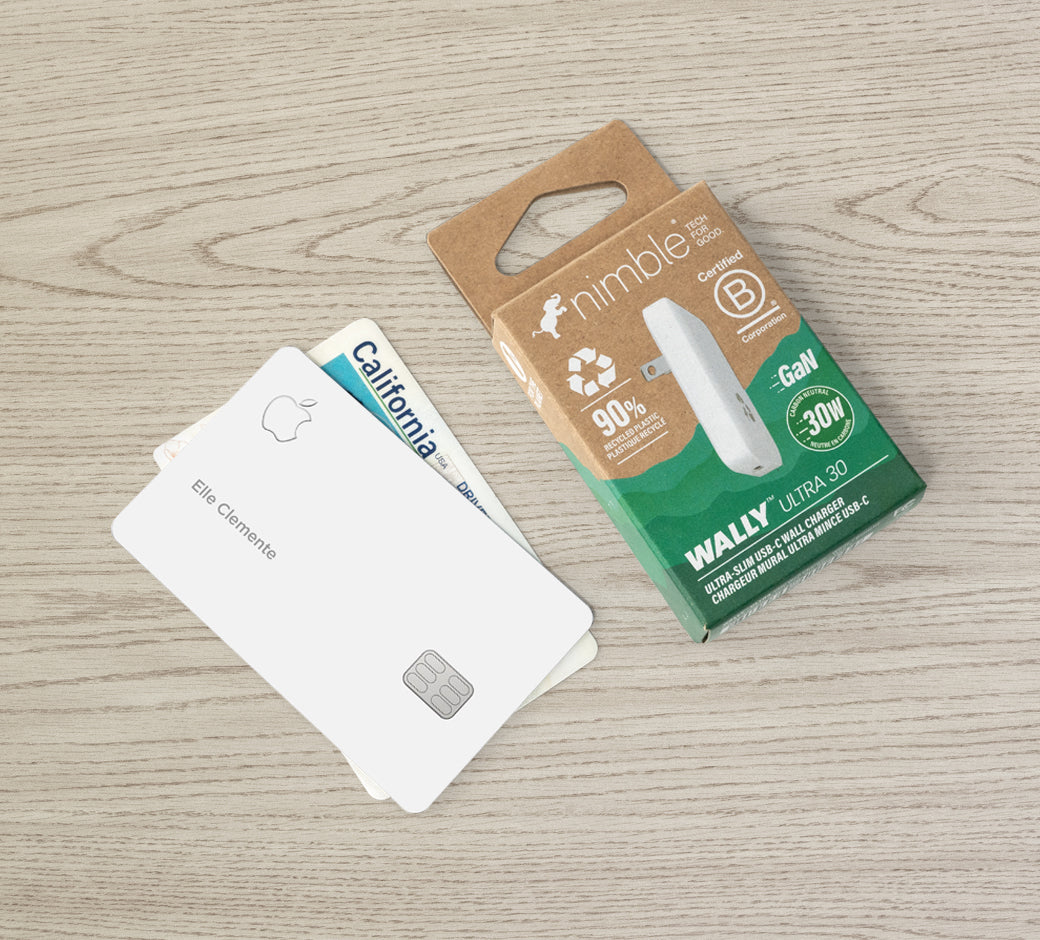 Wally Ultra 30W slim charger packaging next to credit cards for size comparison.