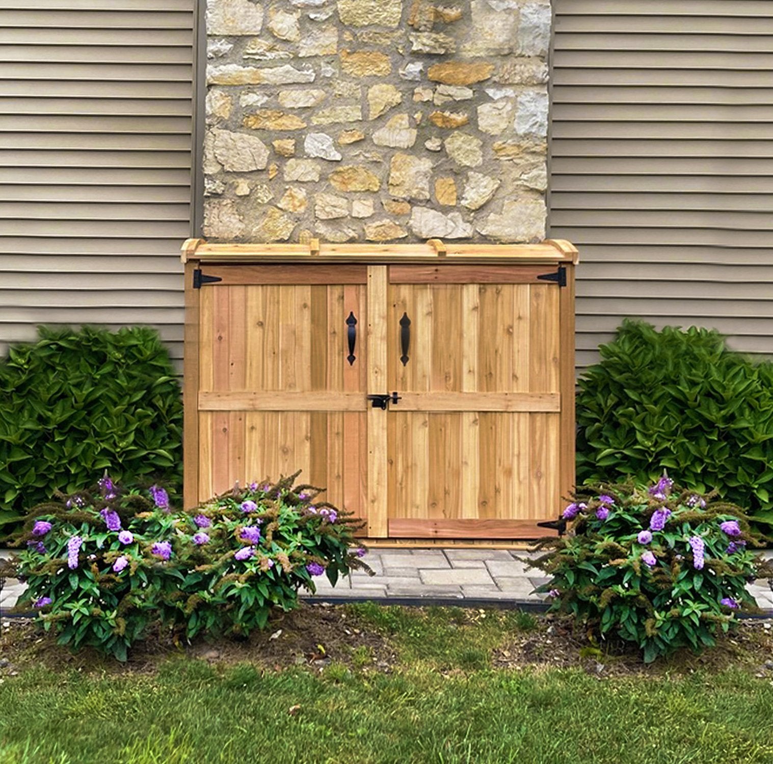 Oscar Waste Management Shed 6x3 in the backyard. This shed for garbage keeps your bins hidden away, making your space look tidy.