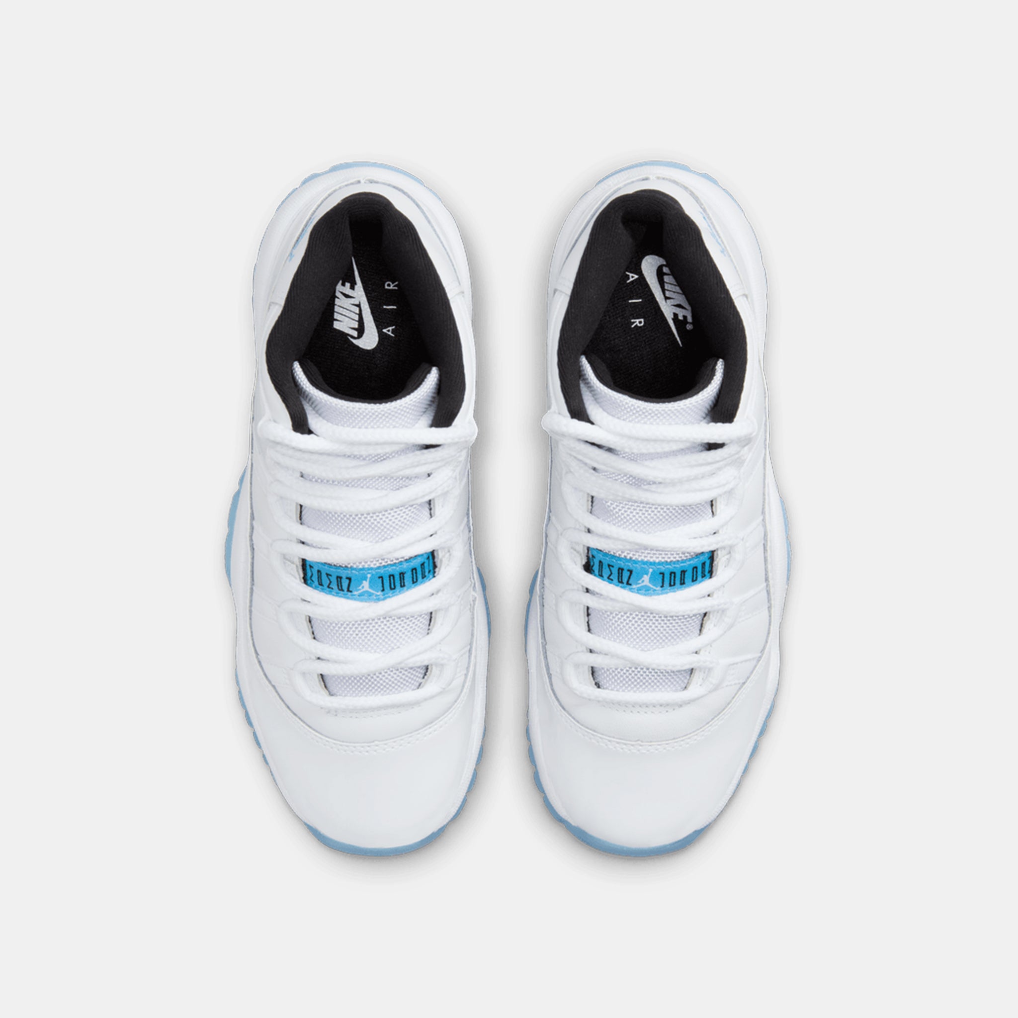 Air Jordan 11 Retro Big Kids Sneaker in White/Legend Blue/Black