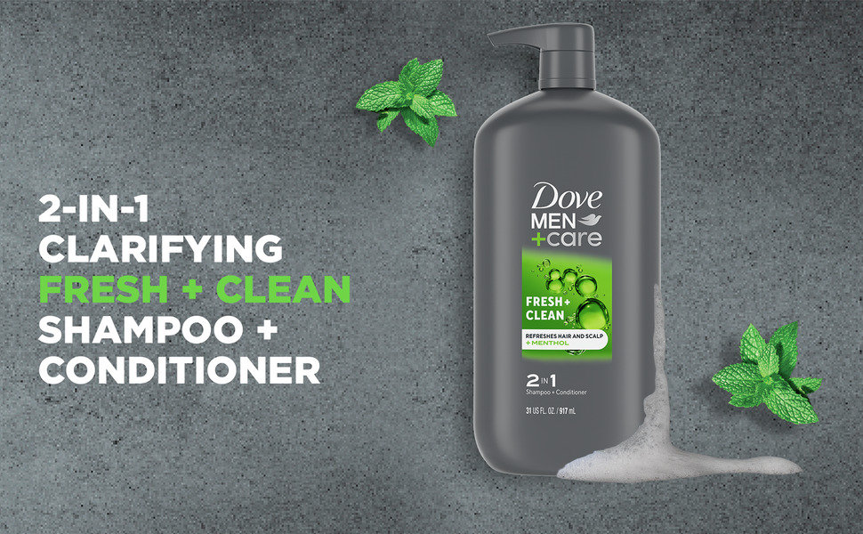 A product shot showing a Dove 2-in-1 pump bottle drippinglather onthe side and a couple ofmintleaves