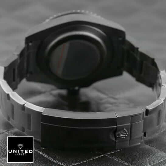 Rolex Blaken Submariner Oyster Bracelet and Clasp on the Black Table