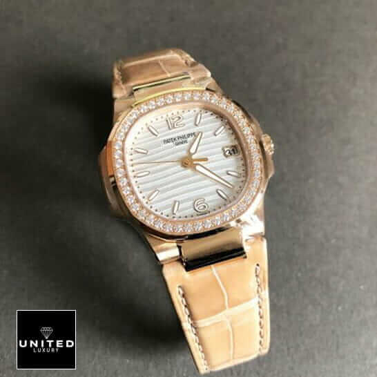Patek Philippe Nautilus 7010R-011 Replica 1 Patek Philippe Geneve 7010 Diamond Bezel Leather Bracelet Replica grey background