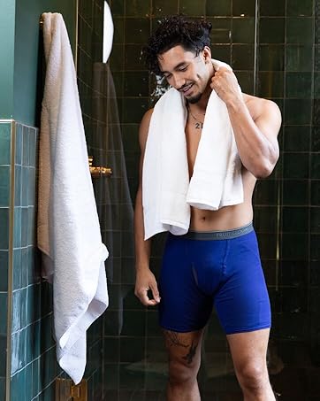 Man in bathroom wearing boxer brief
