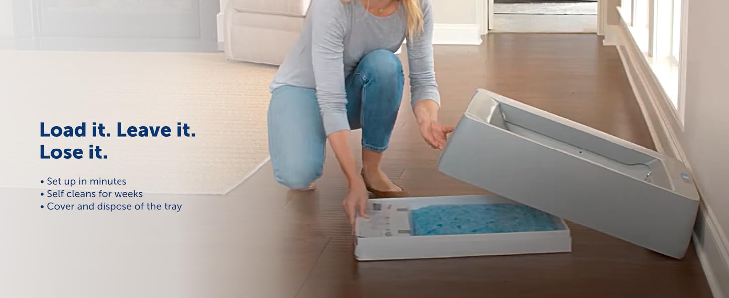 Load it. Leave it. Lose it. Woman changing PetSafe ScoopFree crystal litter tray 