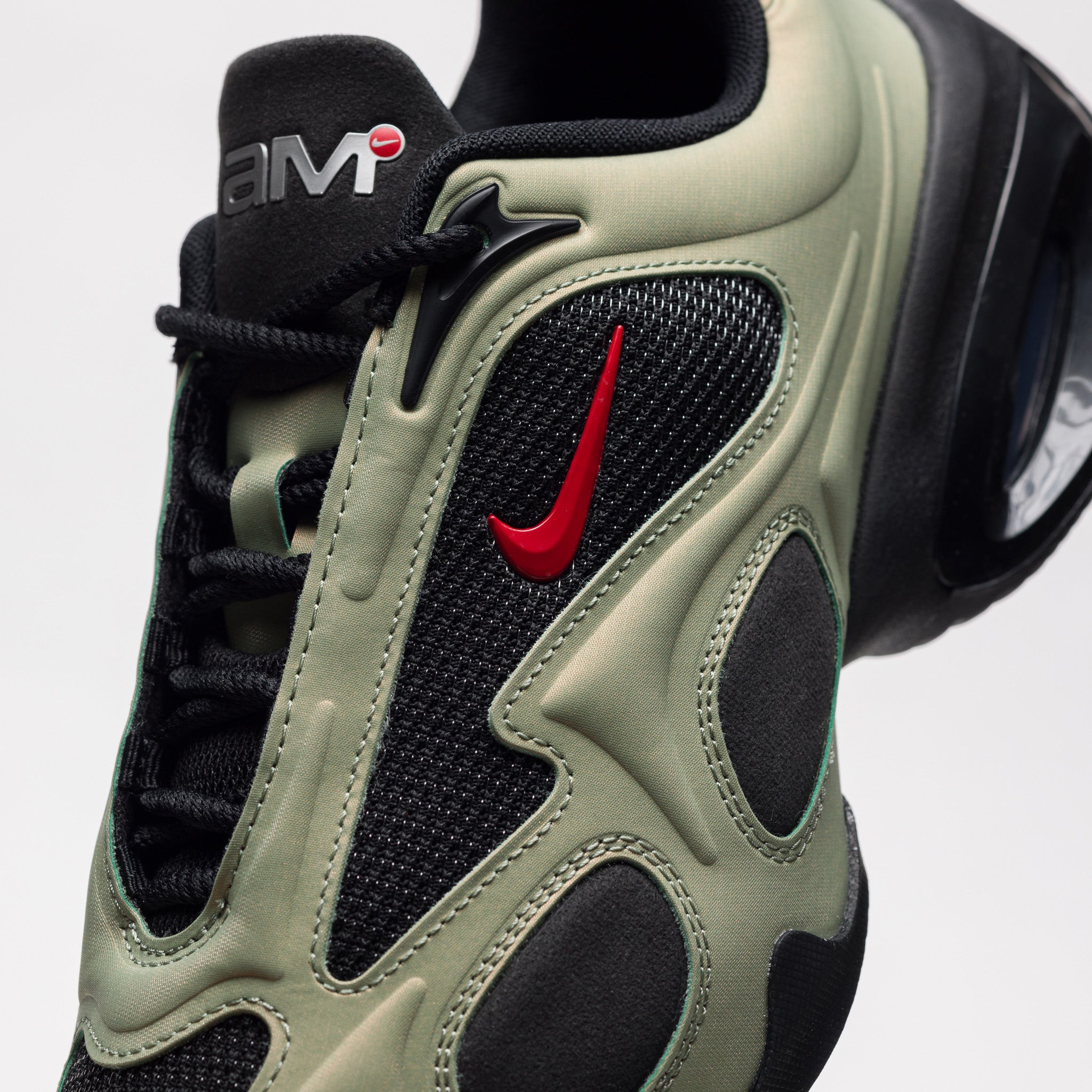 Air Max Muse Sneaker in Black/University Red/Oil Green