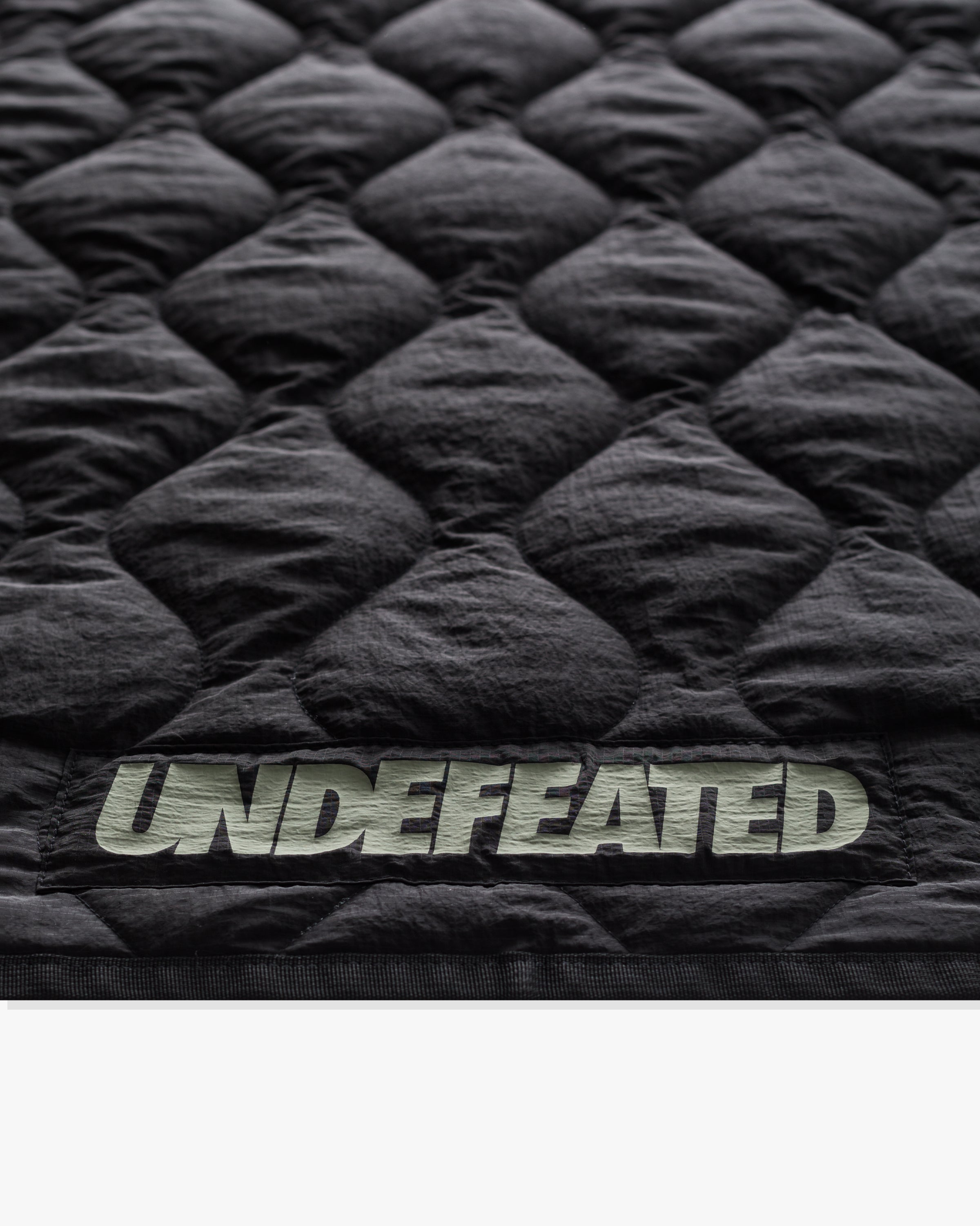 UNDEFEATED QUILTED BLANKET