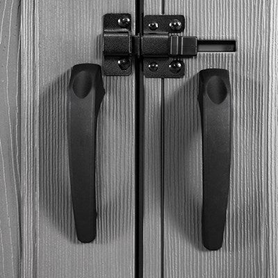 Close-up of the black locking latch and handles on the double doors of a Lifetime 20x8 outdoor storage shed, which has a textured, woodgrain-style exterior.