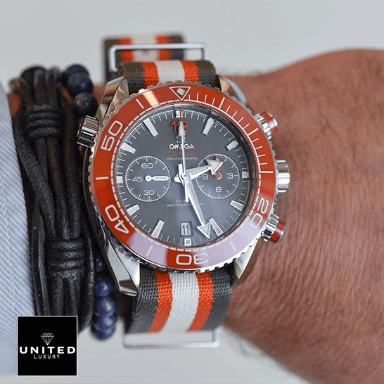 Omega Seamaster Planet Ocean Grey Dial Replica next to bracelet