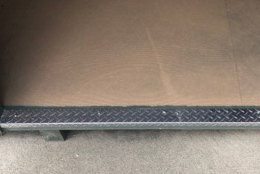homestead storage shed kit wooden floor with a metal diamond plate edge for added durability and traction.
