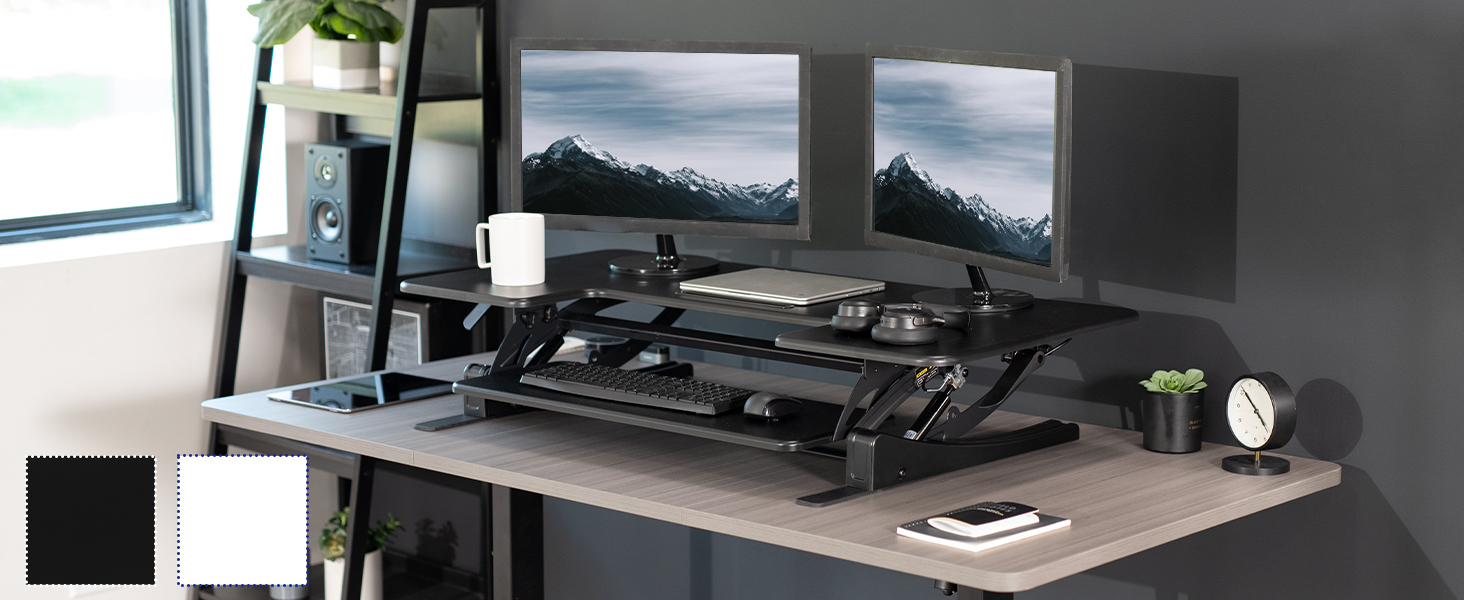 48 desk riser on grey desktop in home office setting