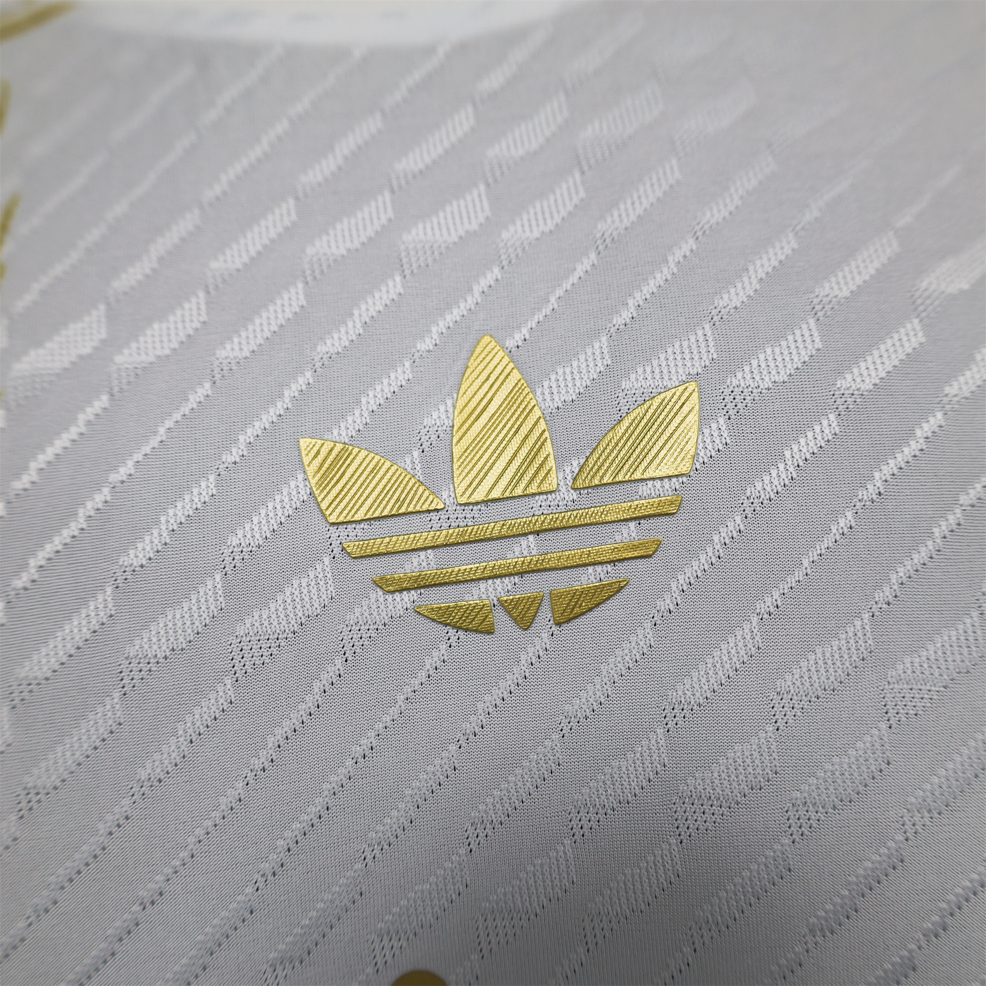 JerseysGala.com | Real Madrid 24-25 Gold Dragons Pattern White Special Edition Jersey - Player Version -Customize Name, Number and Patch | Worldwide Shipping