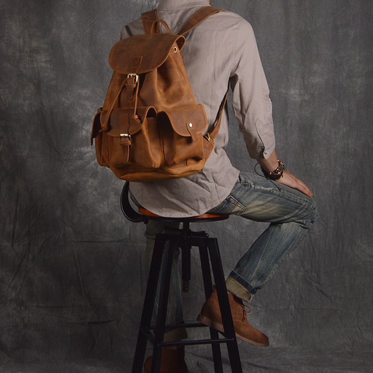Model Show of Woosir Women Men Genuine Leather Vintage Backpack