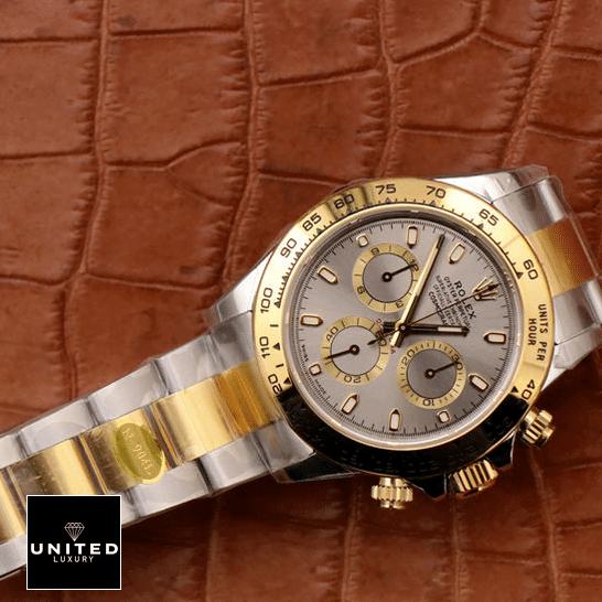 Rolex Daytona Cosmograph 116503 Stainless Steel & Yellow Gold Oyster Replica on the table