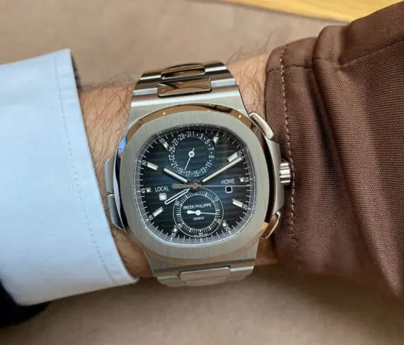 Nautilus, 5990/1A-001 A Stainless Steel Dual Time Zone Flyback Chronograph Wristwatch With Date, Dual Day/night Indication And Bracelet Circa 2016 Fine Watches 2022 Sotheby's | gensoudiary.com