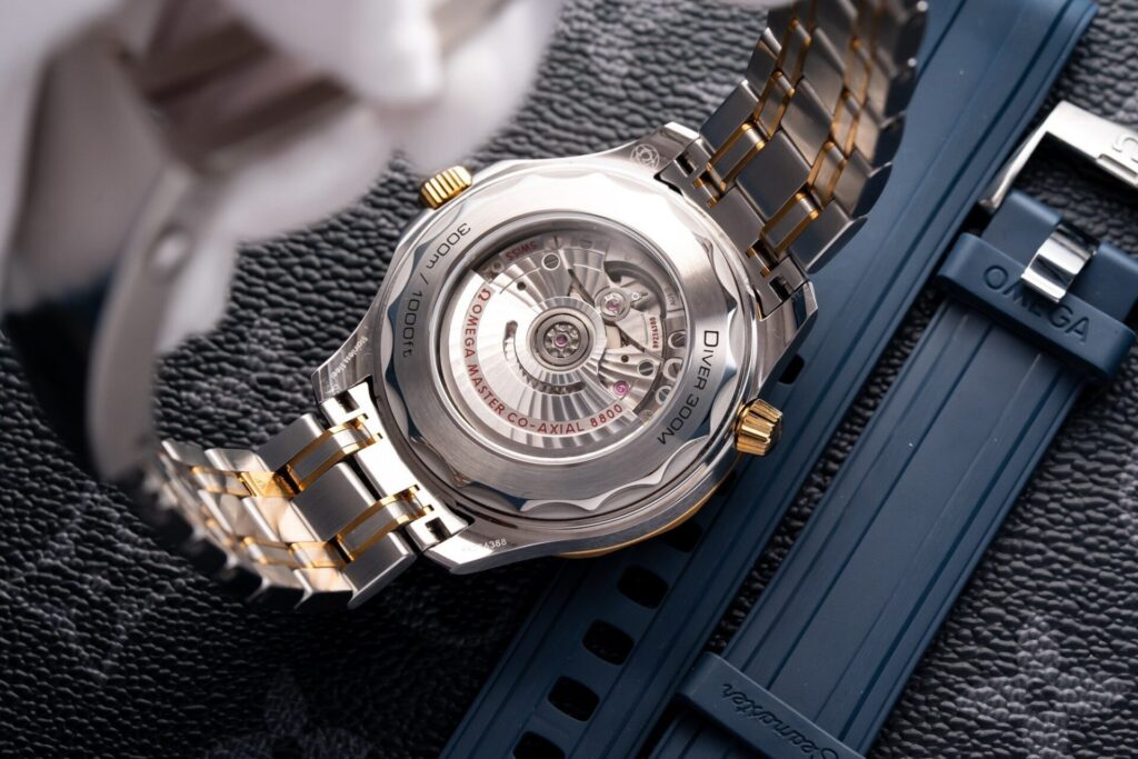 Đồng Hồ Omega Seamaster DemiGold Replcia 11 Mặt Xanh 42mm (1)
