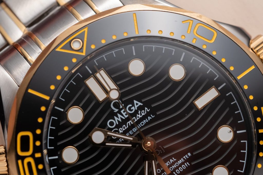 Đồng Hồ Omega Seamaster Replica 11 VS Factory Demi Gold (2)
