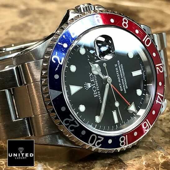 Rolex 16710 Replica 5 Rolex Submariner GMT-Master II Red & Blue Bezel 16710 Oyster Replica on the Table