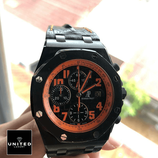 Audemars Piguet Royal Oak Orange Black Dial Replica on the hand