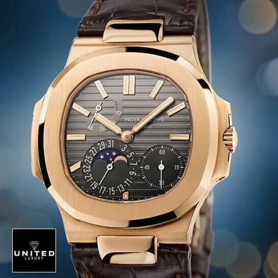 Patek Philippe Nautilus Gold Leather Replica 6 Patek Philippe Nautilus Black Dial Leather Bracelet Replica blue background