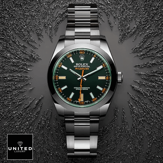 Rolex Milgauss 116400GV-0001 Green Crystal Oyster Replica on the table