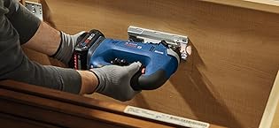 bosch cordless 18v ampshare core18v jigsaw cutting access hole in the back of a wood cabinet