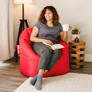 Woman sitting in Milano Bean Bag Chair
