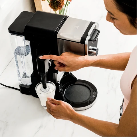 Fold-away frother