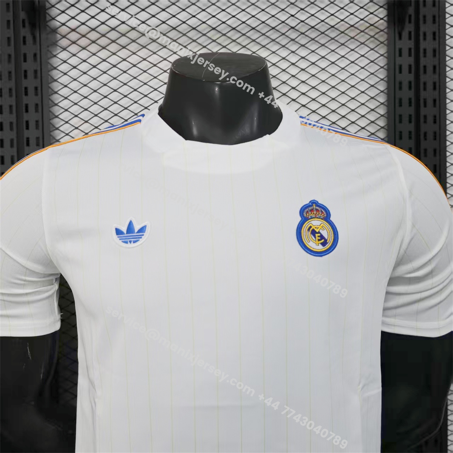 ManixJersey.com | Real Madrid 25-26 Trefoil Blue Lines White Travel Jersey - Player Version -Customize Name, Number and Patch | Worldwide Shipping