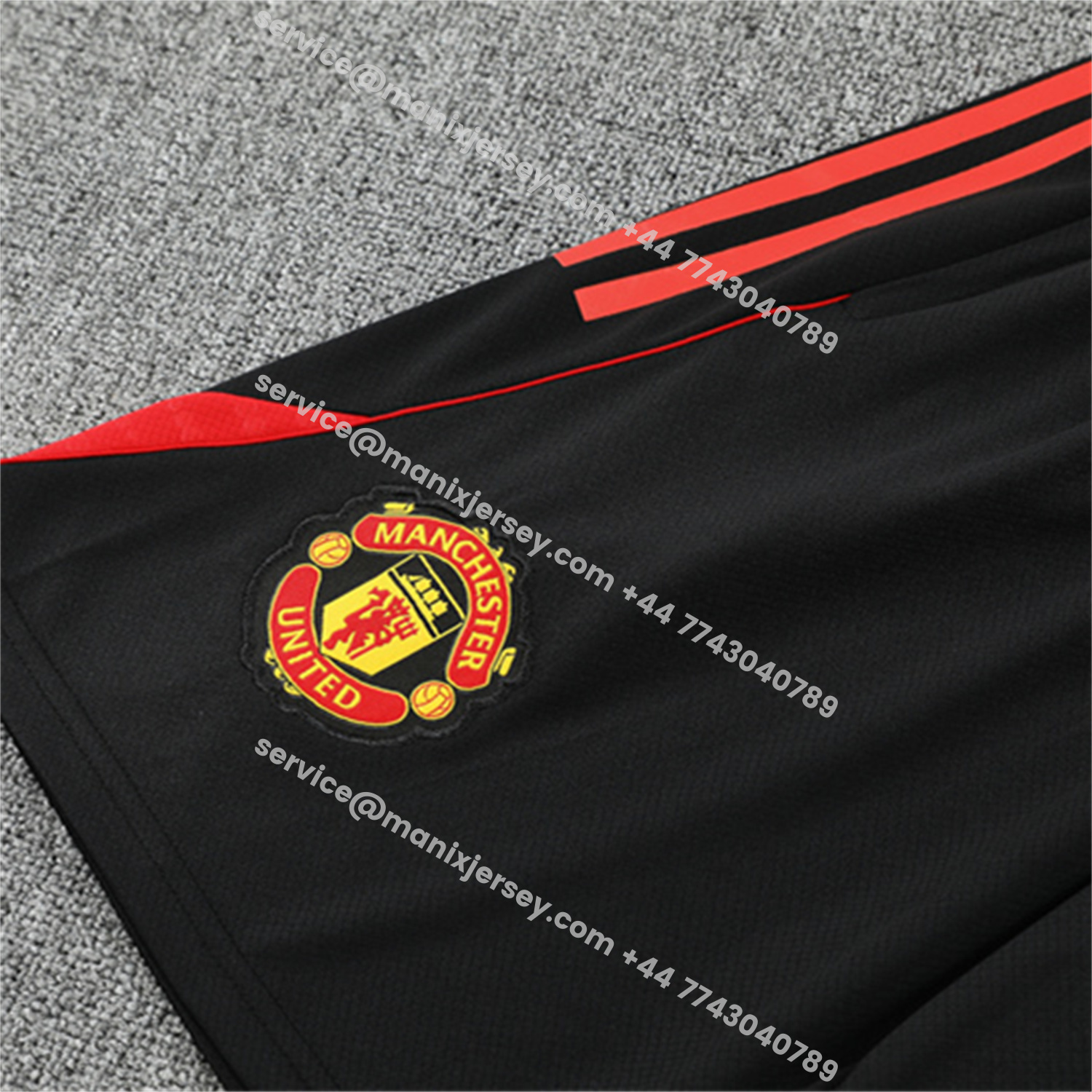 ManixJersey.com | Manchester United 25-26 Kids Short-Sleeve Training Set - Red Camouflage Top & Black Shorts -Customize Name, Number and Patch | Worldwide Shipping