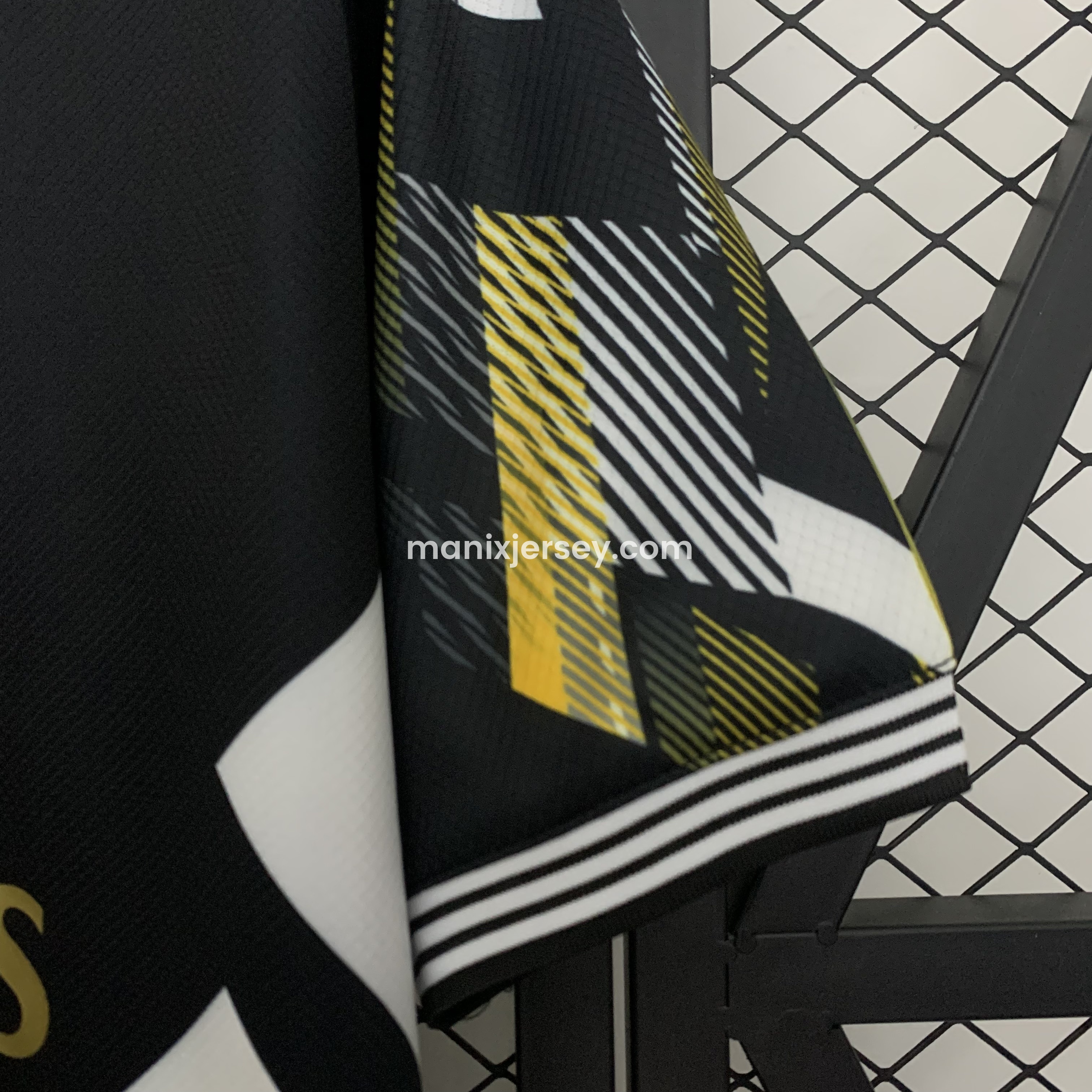ManixJersey.com | Real Madrid 25-26 Black Gold White Three Bars Jersey - Fans Version -Customize Name, Number and Patch | Worldwide Shipping