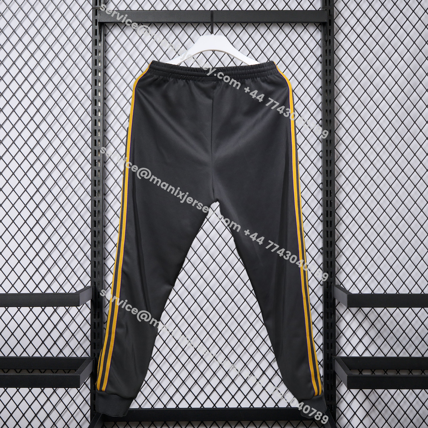 ManixJersey.com | Manchester United 25-26 Pure Color Training Set - Black Top and Black Pants -Customize Name, Number and Patch | Worldwide Shipping