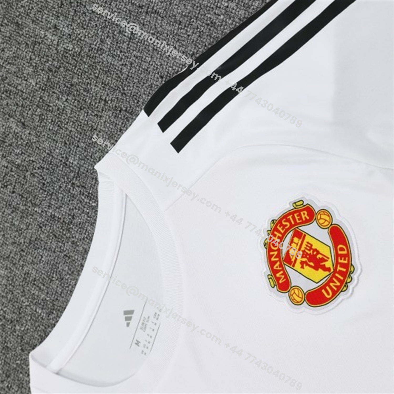 ManixJersey.com | Manchester United 25-26 Short-Sleeve Training Set - Red Black Blocks White Top & Black Shorts -Customize Name, Number and Patch | Worldwide Shipping