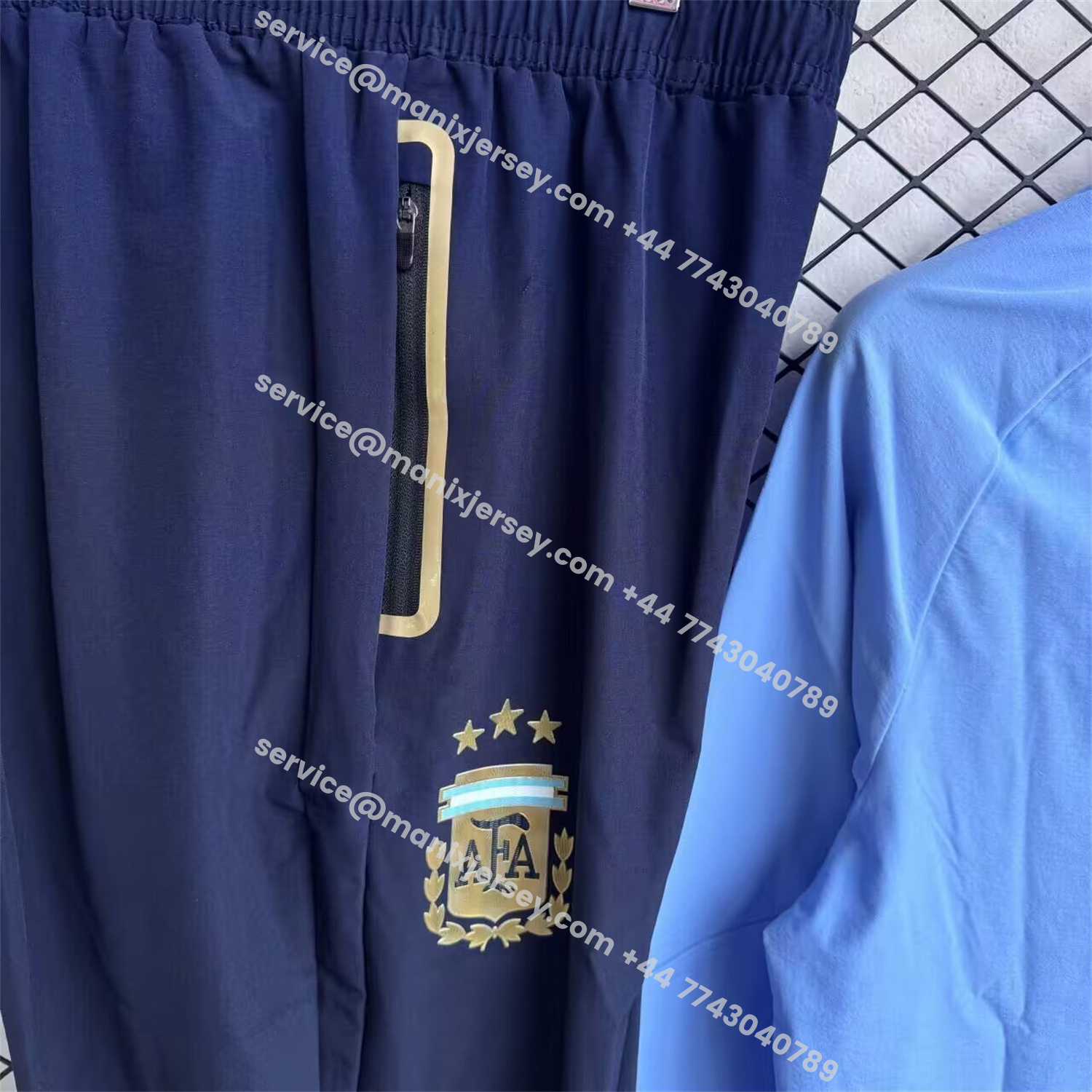 ManixJersey.com | Argentina 2026 Windbreaker Training Set - Blue Top and Black Pants -Customize Name, Number and Patch | Worldwide Shipping