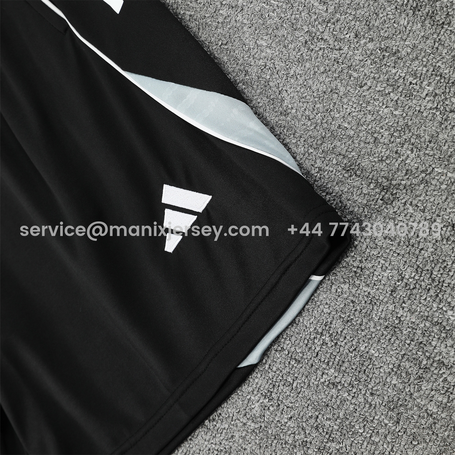 ManixJersey.com | Real Madrid 25-26 Short-Sleeve Training Set - Colorful Curve Pattern Top & Black Shorts -Customize Name, Number and Patch | Worldwide Shipping