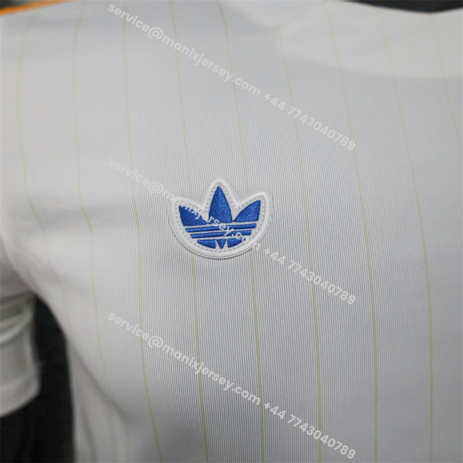 ManixJersey.com | Real Madrid 25-26 Trefoil Blue Lines White Travel Jersey - Player Version -Customize Name, Number and Patch | Worldwide Shipping