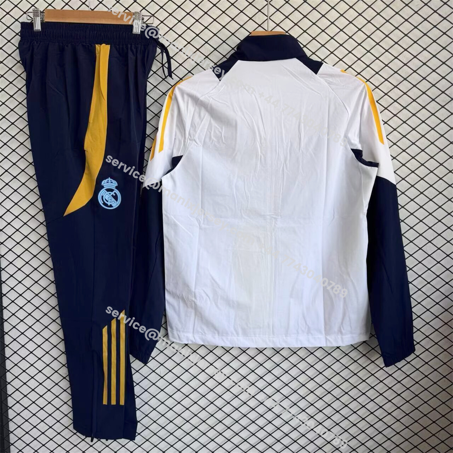 ManixJersey.com | Real Madrid 25-26 Windbreaker Training Set - White Top and Black Pants -Customize Name, Number and Patch | Worldwide Shipping