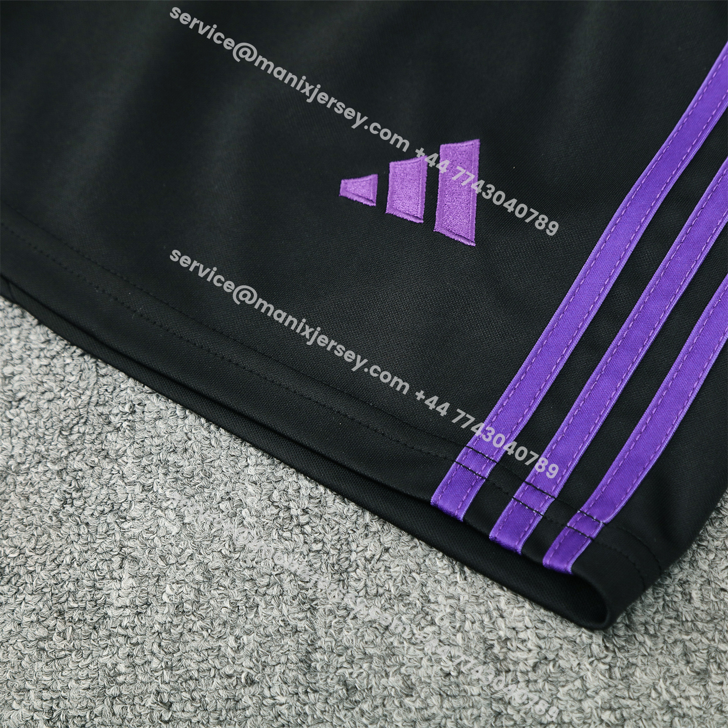 ManixJersey.com | Real Madrid 25-26 Short-Sleeve Training Set - Blue Edge Black Top & Black Shorts -Customize Name, Number and Patch | Worldwide Shipping