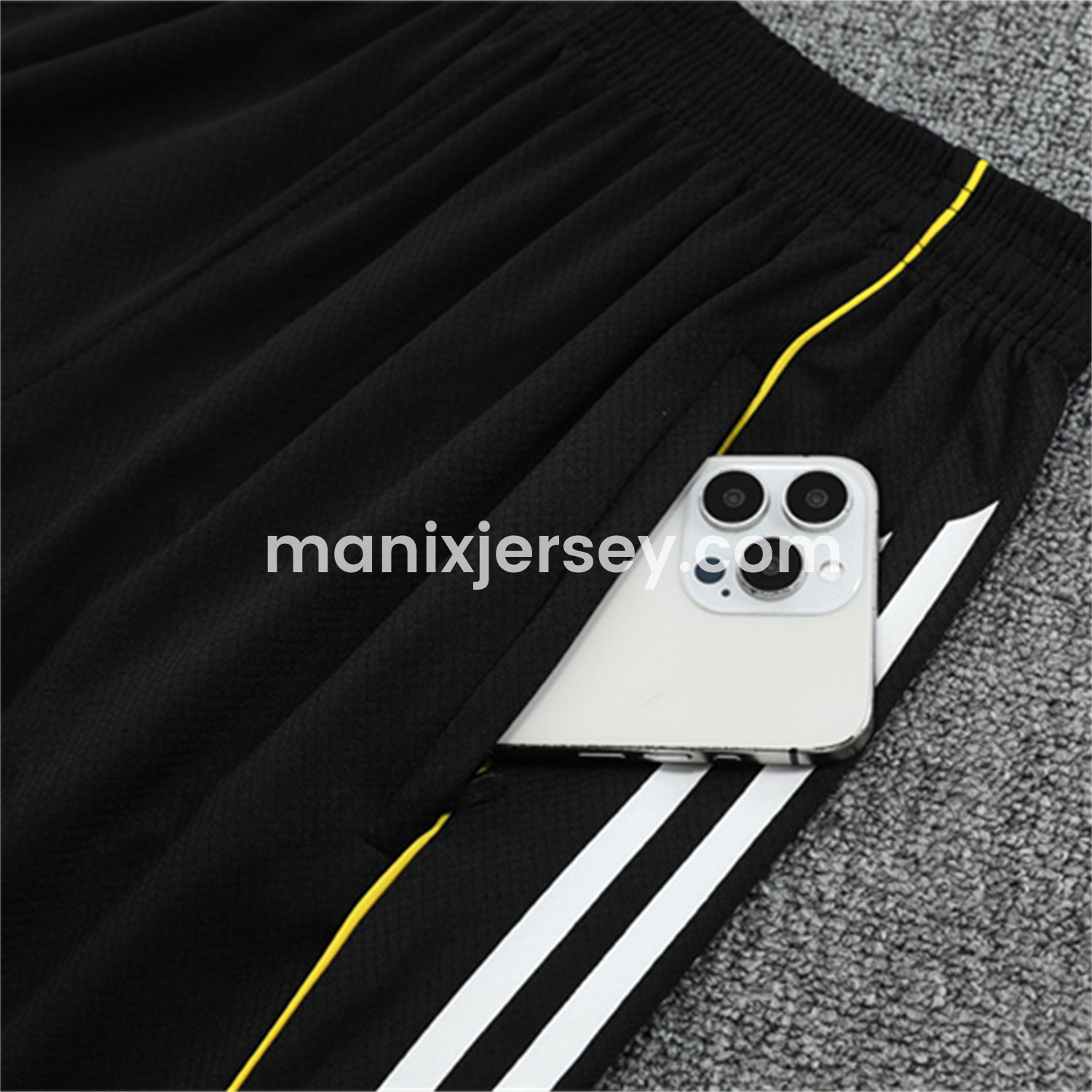 ManixJersey.com | Real Madrid 25-26 Short-Sleeve Training Set - Yellow Line Black Top and Black Shorts -Customize Name, Number and Patch | Worldwide Shipping