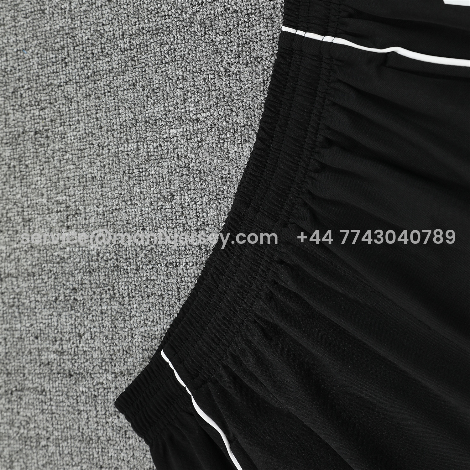 ManixJersey.com | Real Madrid 25-26 Short-Sleeve Training Set - Grey Arrow Pattern Top & Black Shorts -Customize Name, Number and Patch | Worldwide Shipping