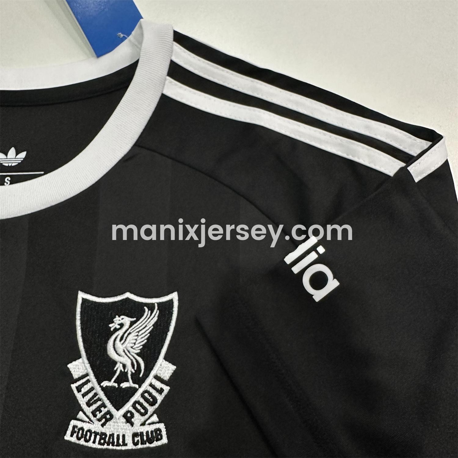 ManixJersey.com | Liver.pool 25-26 Black Trefoil Goalkeeper Jersey - Fans Version -Customize Name, Number and Patch | Worldwide Shipping