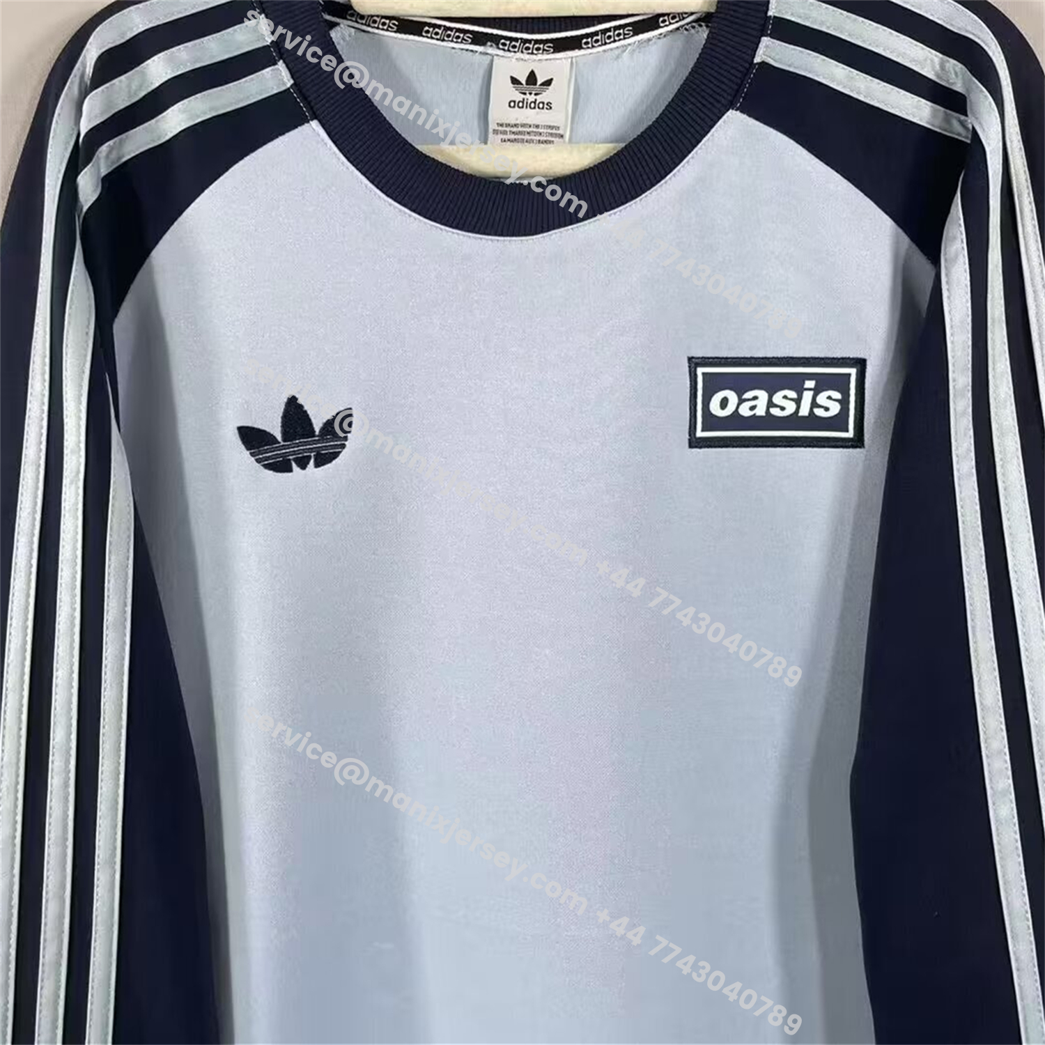 ManixJersey.com | Adidas 25-26 Oasis Originals Tour Light Blue Long Sleeves Jersey - Fans Version -Customize Name, Number and Patch | Worldwide Shipping
