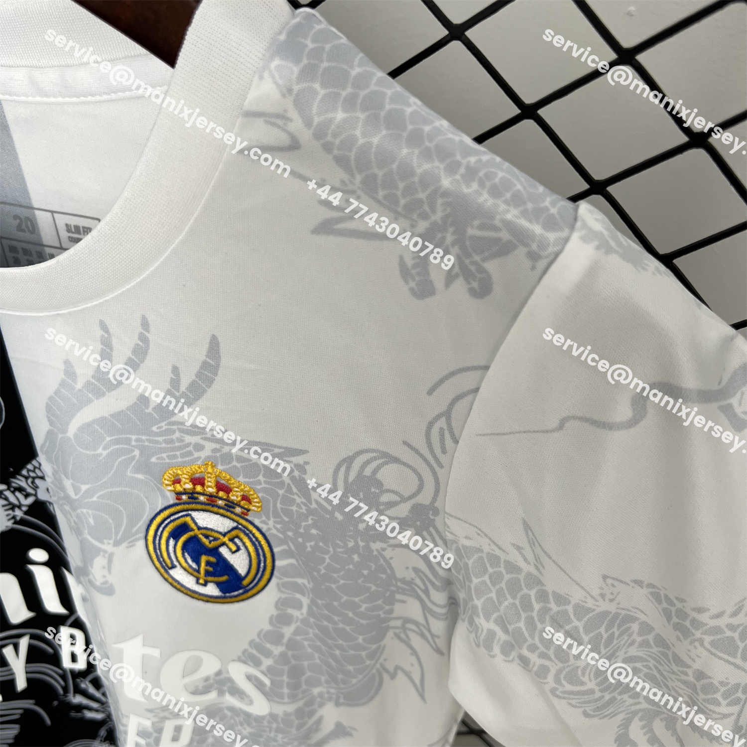 ManixJersey.com | Real Madrid 25-26 Dragon White And Black Special Kids Kit -Customize Name, Number and Patch | Worldwide Shipping