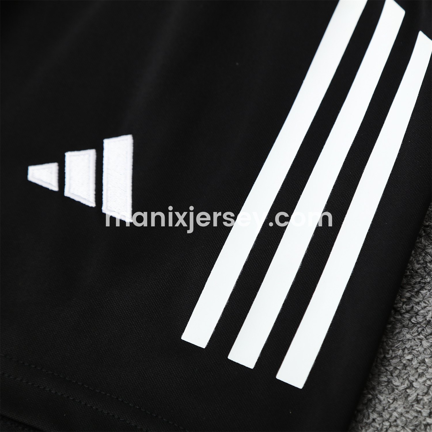 ManixJersey.com | Real Madrid 25-26 Short-Sleeve Training Set - Blue Black Dragon Top & Black-White Shorts -Customize Name, Number and Patch | Worldwide Shipping